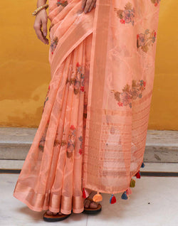 Collection of Peach Organza Floral Print Saree With Tussels and Contrasting Blue Blouse in a gallery layout