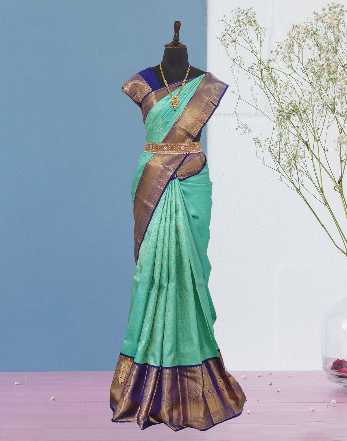 Collection of Sea Green Kanchi Pattu Pure Silk Saree with Contrast Border in a gallery layout