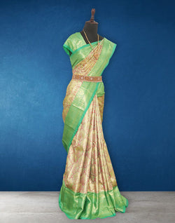 Collection of Light Green Floral Tissue Jaal Kanchi Pattu Pure Silk Saree in a gallery layout