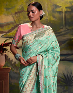 Collection of Sea Green Pure Dola Silk Saree With Fancy Lace Border and Embroidery Work Blouse in a gallery layout