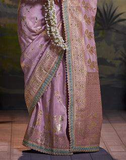 Collection of Purple Coloured Pure Dola Silk Floral Saree With Fancy Lace Border in a gallery layout