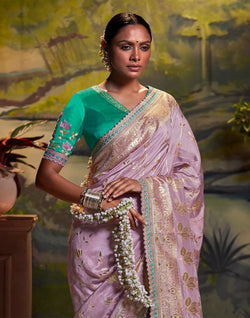 Collection of Purple Coloured Pure Dola Silk Floral Saree With Fancy Lace Border in a gallery layout