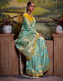 Collection of Aqua Blue Pure Dola Silk Floral Saree With Fancy Lace Border and Embroidery Work Blouse in a gallery layout