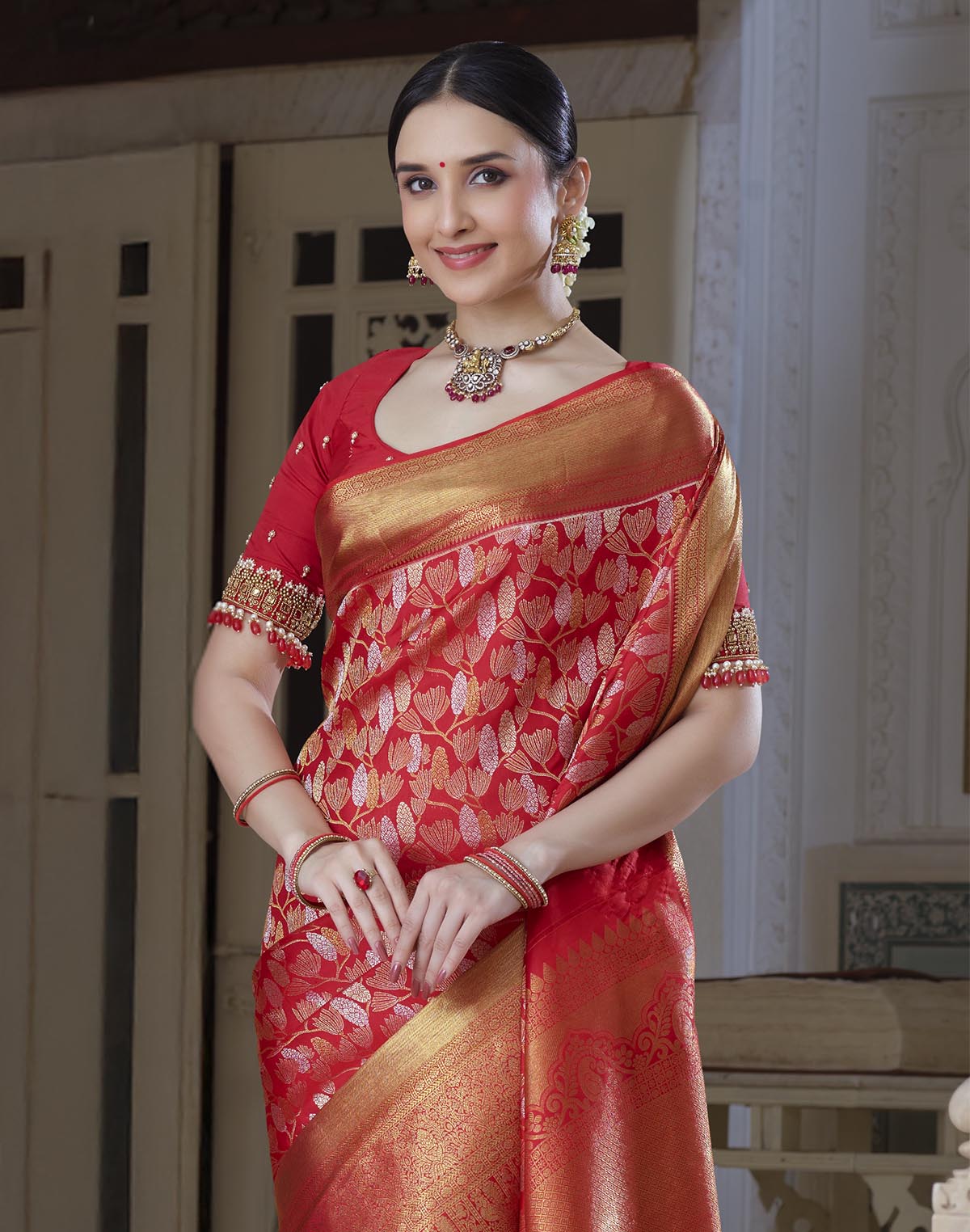 Collection of Red Kanchipuram Pure Silk Self Blouse and Self Saree in a gallery layout