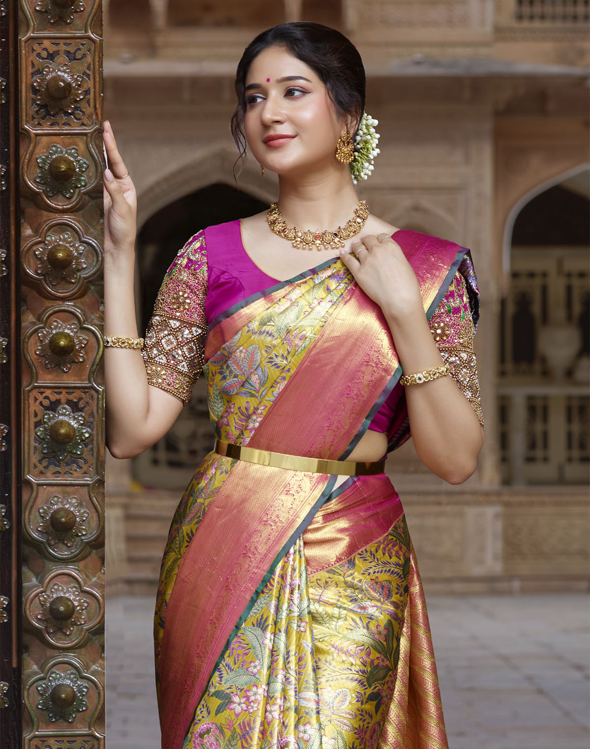 Collection of Mustard Floral Design Kanchipuram Pure Silk Contrast Border Saree in a gallery layout