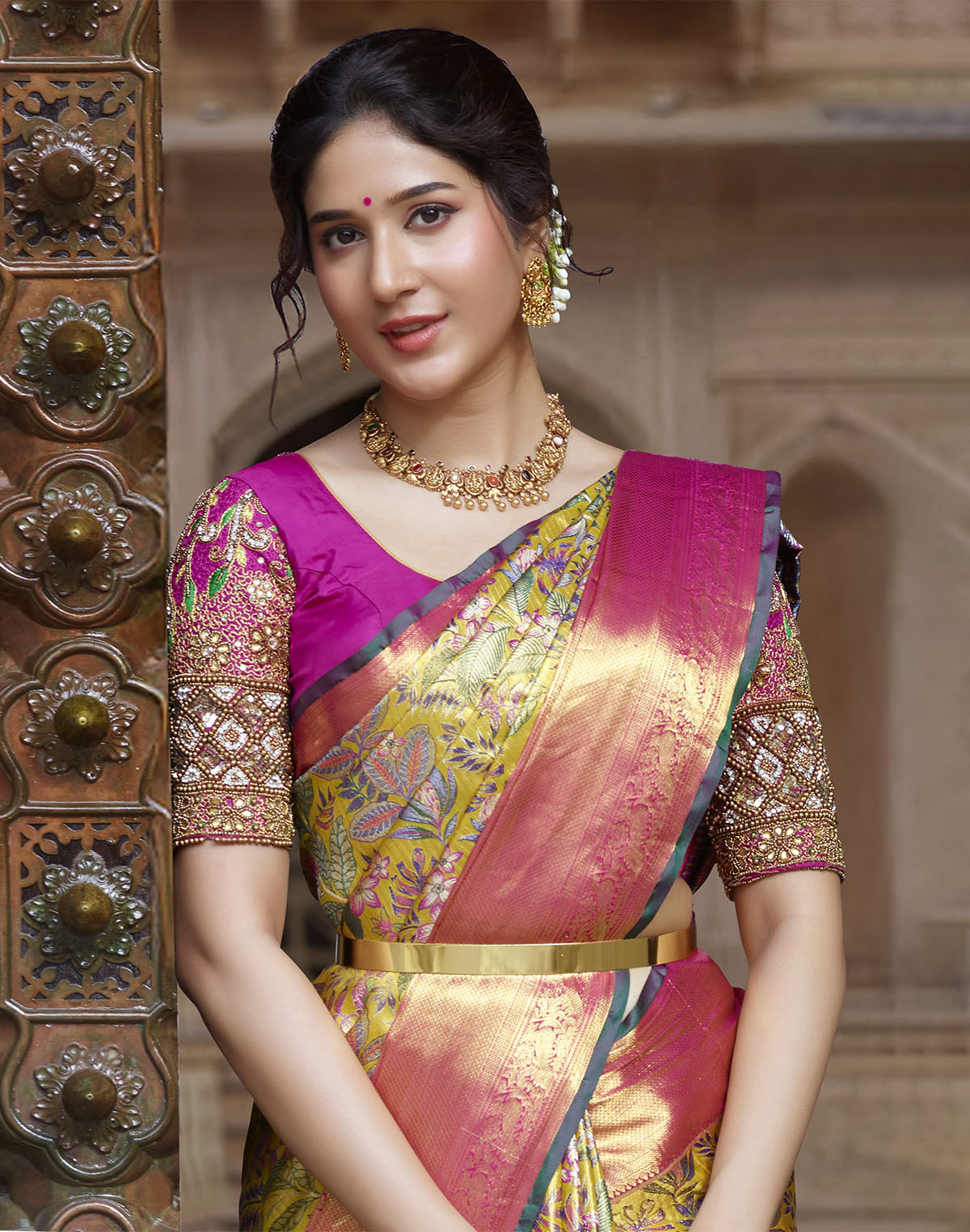 Collection of Mustard Floral Design Kanchipuram Pure Silk Contrast Border Saree in a gallery layout