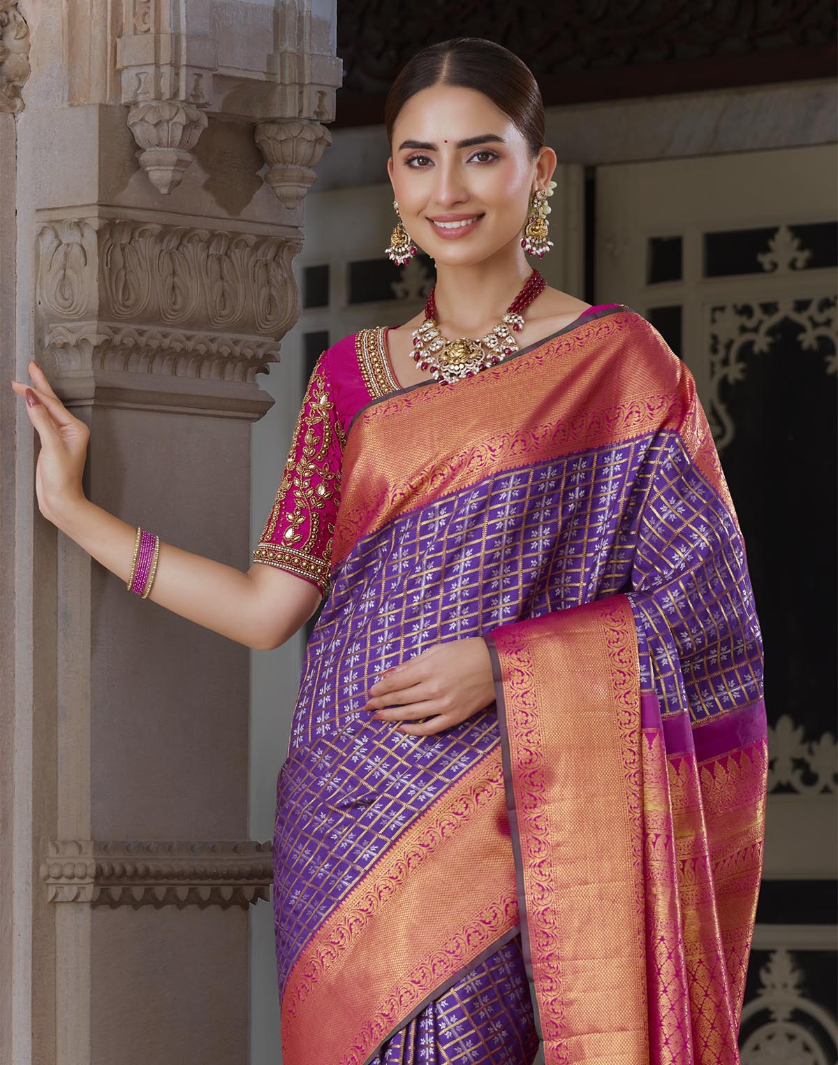 Collection of Elegant Purple Kanchipuram Pure Silk Saree With Contrast Border in a gallery layout