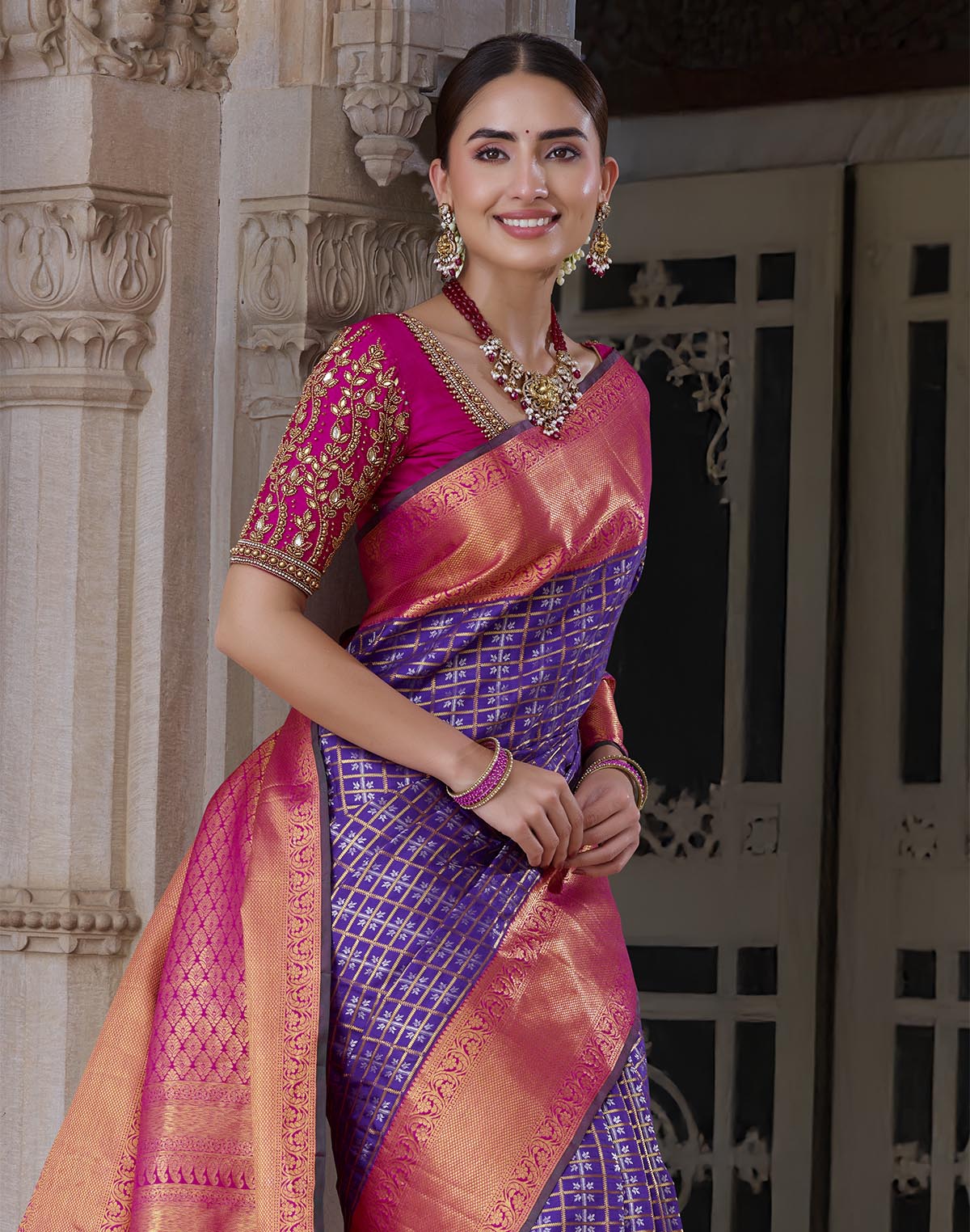 Collection of Elegant Purple Kanchipuram Pure Silk Saree With Contrast Border in a gallery layout