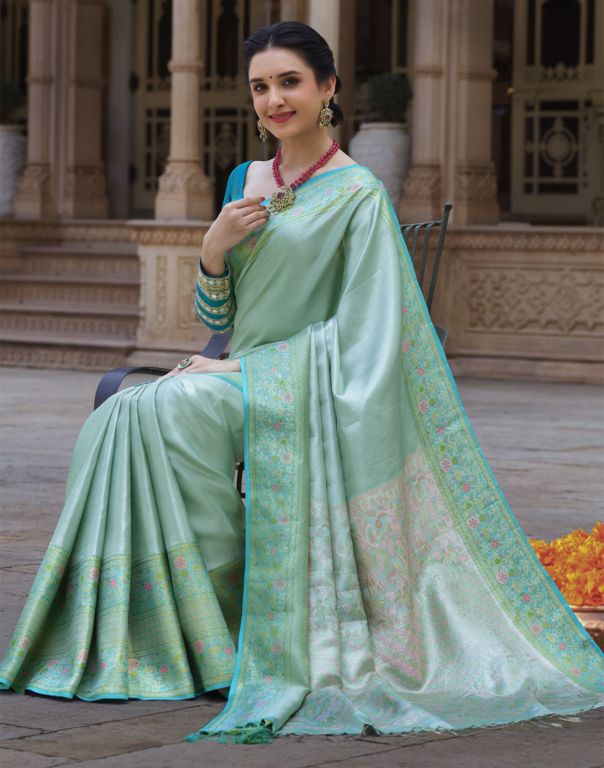 Collection of Sea Green Self Design Kanchipuram Pure Silk Saree in a gallery layout