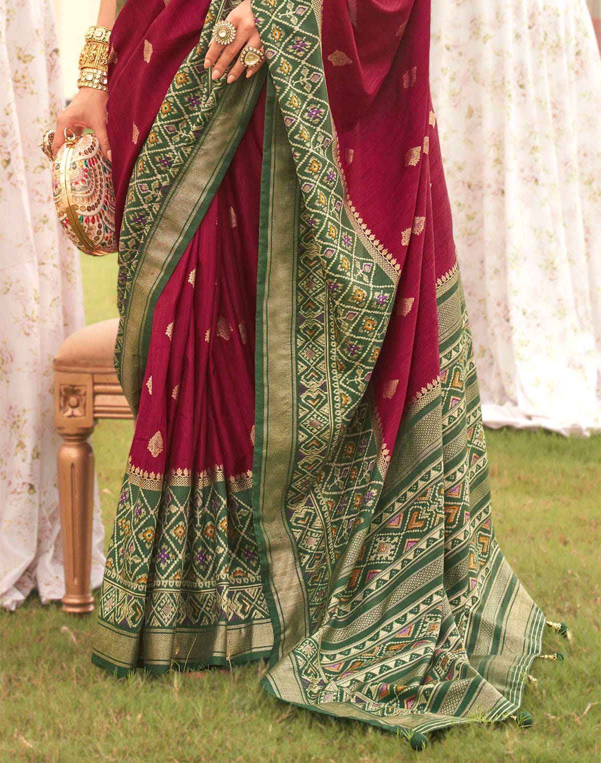 Collection of Maroon Coloured Patola Contrast Saree in a gallery layout