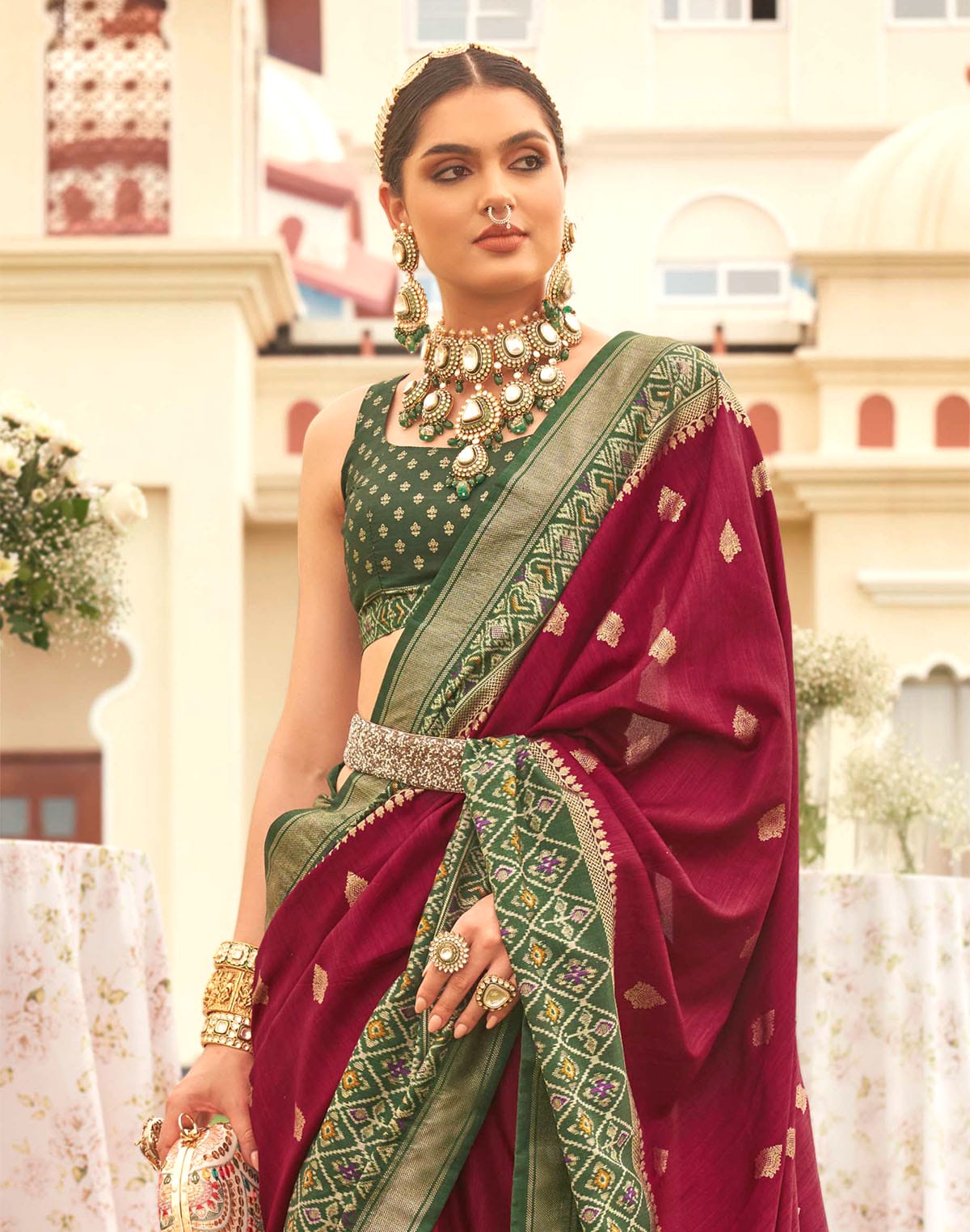 Collection of Maroon Coloured Patola Contrast Saree in a gallery layout