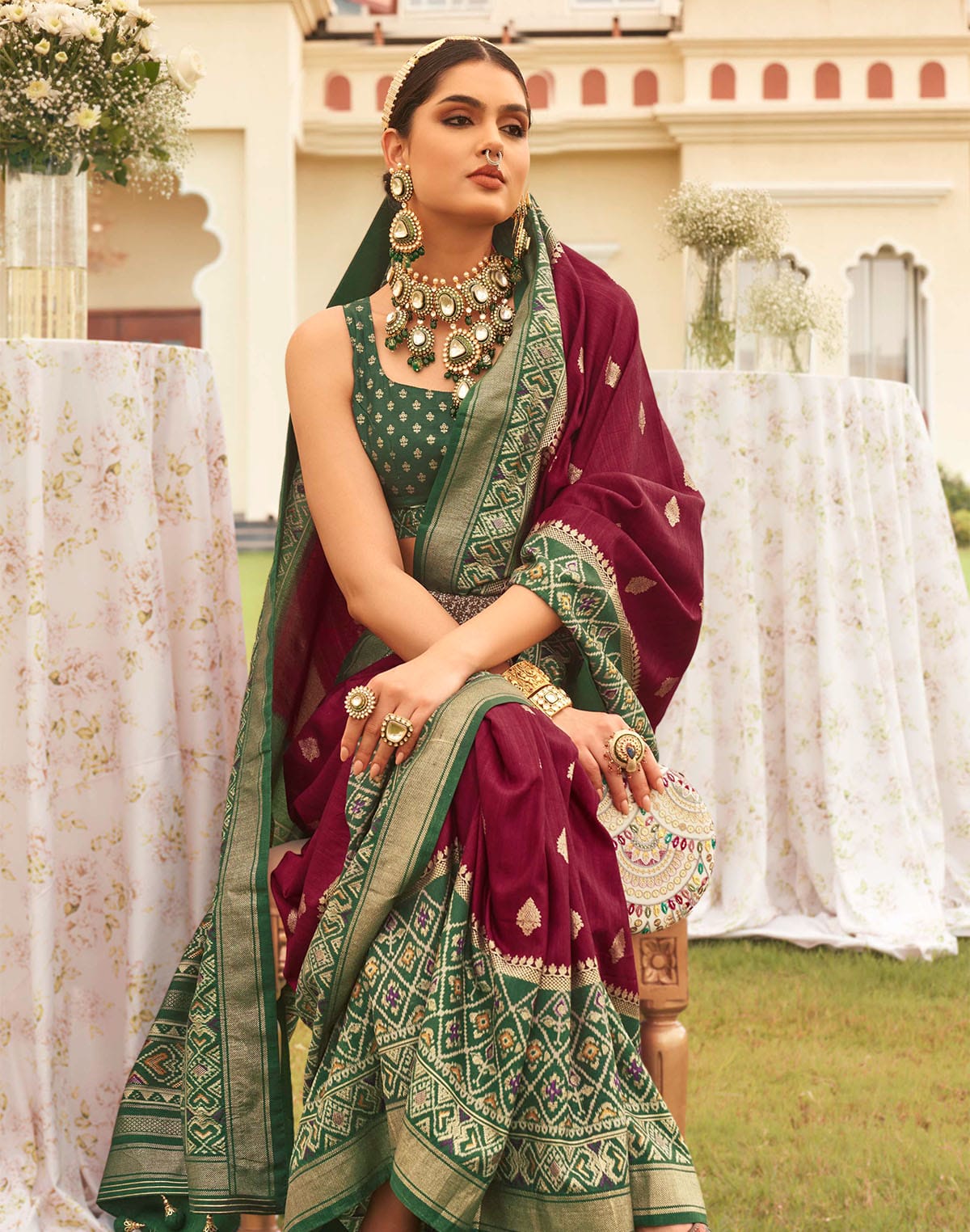 Collection of Maroon Coloured Patola Contrast Saree in a gallery layout