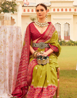 Collection of Mehendi Green Patola  Festive Wear Saree in a gallery layout