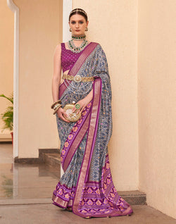 Collection of Grey and Purple Patola Silk Saree with Tussels in a gallery layout