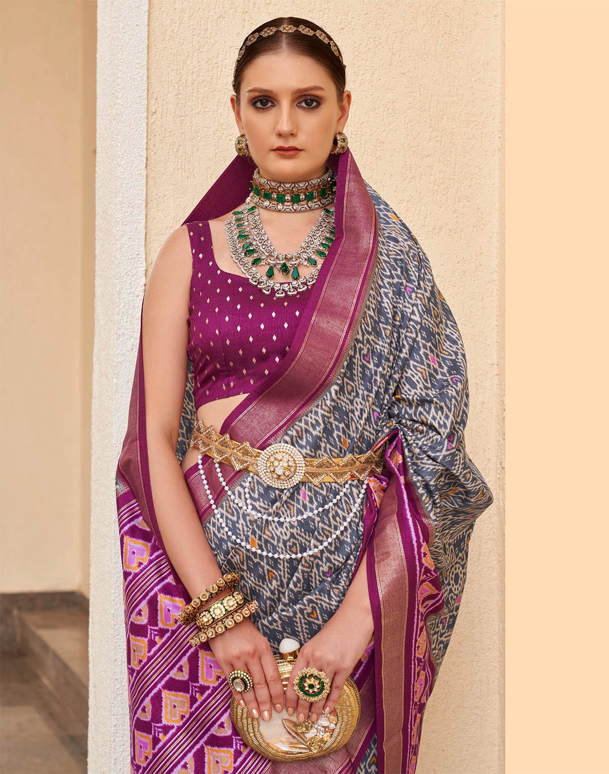 Collection of Grey and Purple Patola Silk Saree with Tussels in a gallery layout