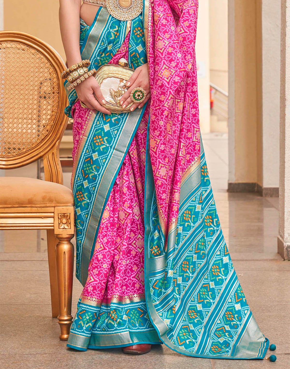 Collection of Pink Printed Designer Patola Silk Saree in a gallery layout