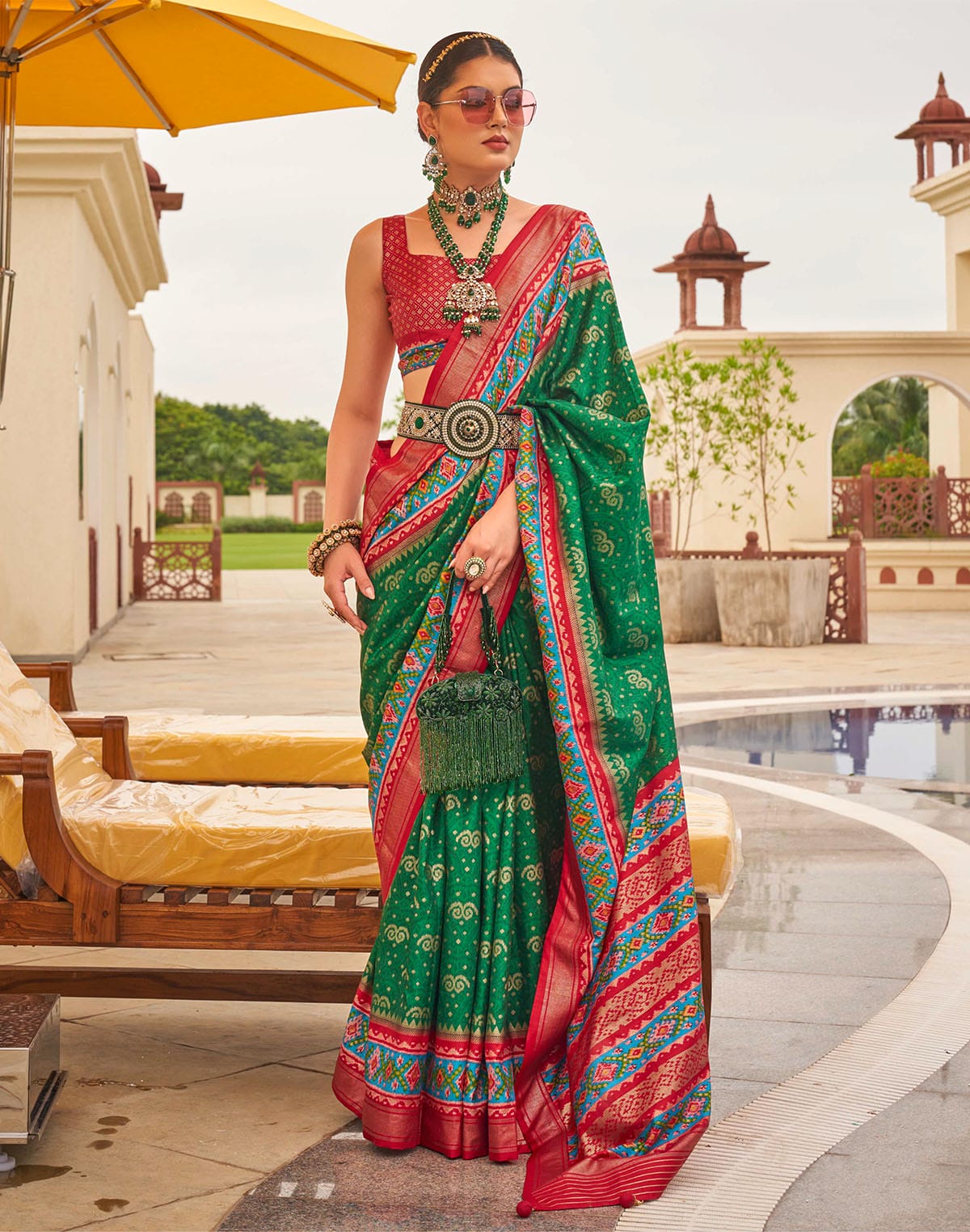 Collection of Patola Silk Ehtnic Motif Printed Saree in Green in a gallery layout