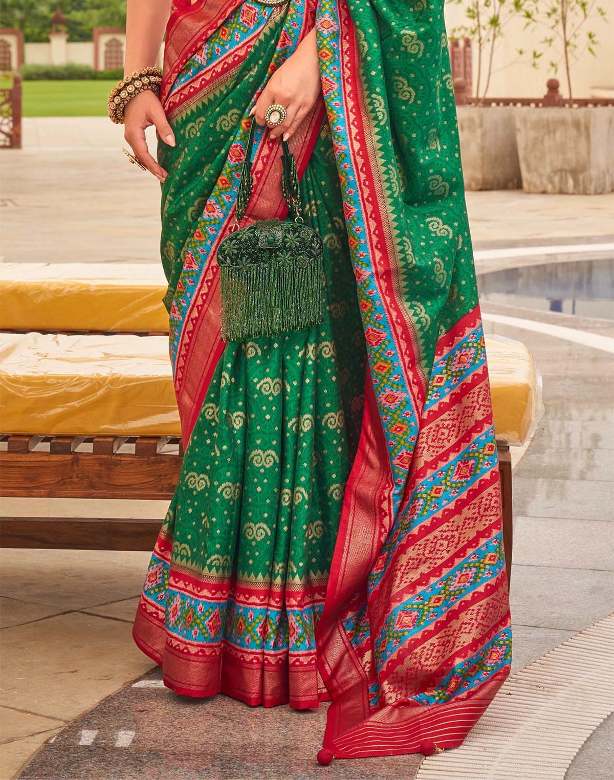 Collection of Patola Silk Ehtnic Motif Printed Saree in Green in a gallery layout