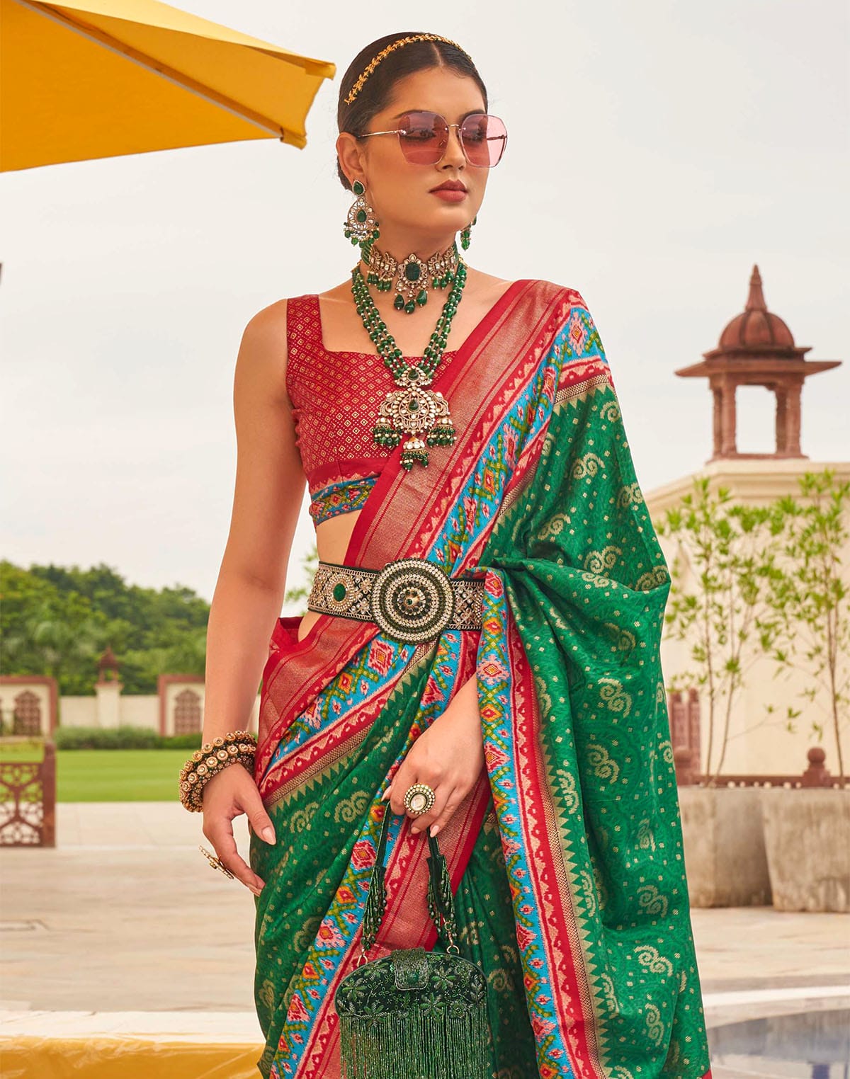 Collection of Patola Silk Ehtnic Motif Printed Saree in Green in a gallery layout