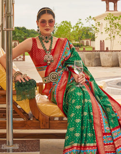 Collection of Patola Silk Ehtnic Motif Printed Saree in Green in a gallery layout