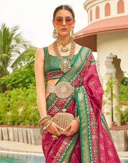 Collection of Wine and Green Patola Silk Saree in a gallery layout