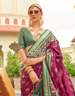 Collection of Brilliant Purple Patola Silk Saree in a gallery layout