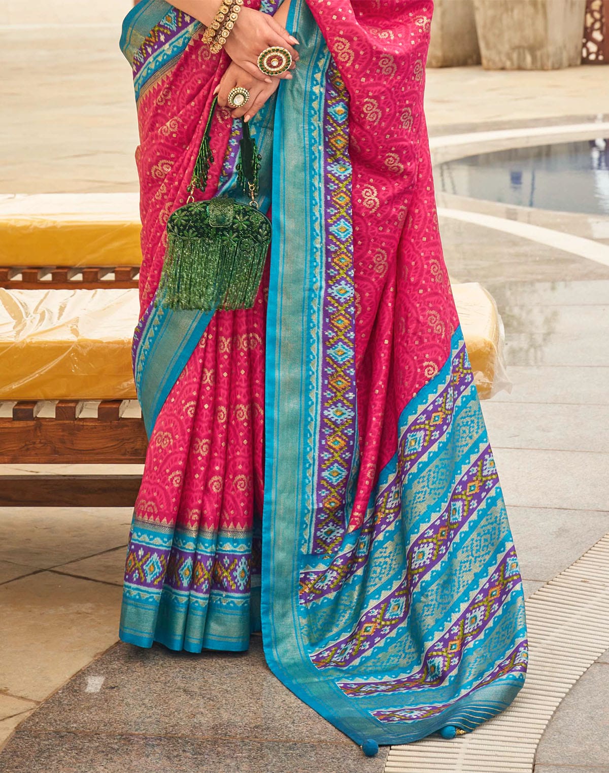 Collection of Pink Coloured Patola Silk Contrast Border Saree in a gallery layout