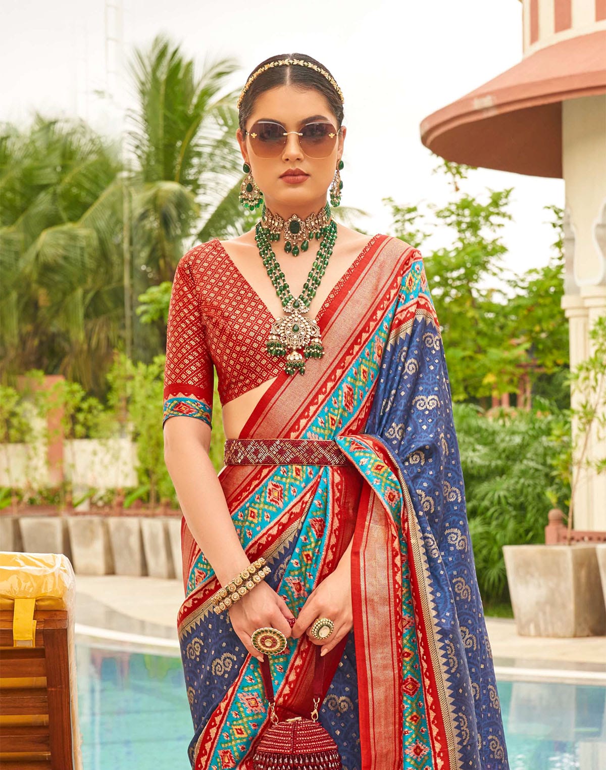 Collection of Light Blue Ethnic Motif Printed Patola Silk Saree in a gallery layout