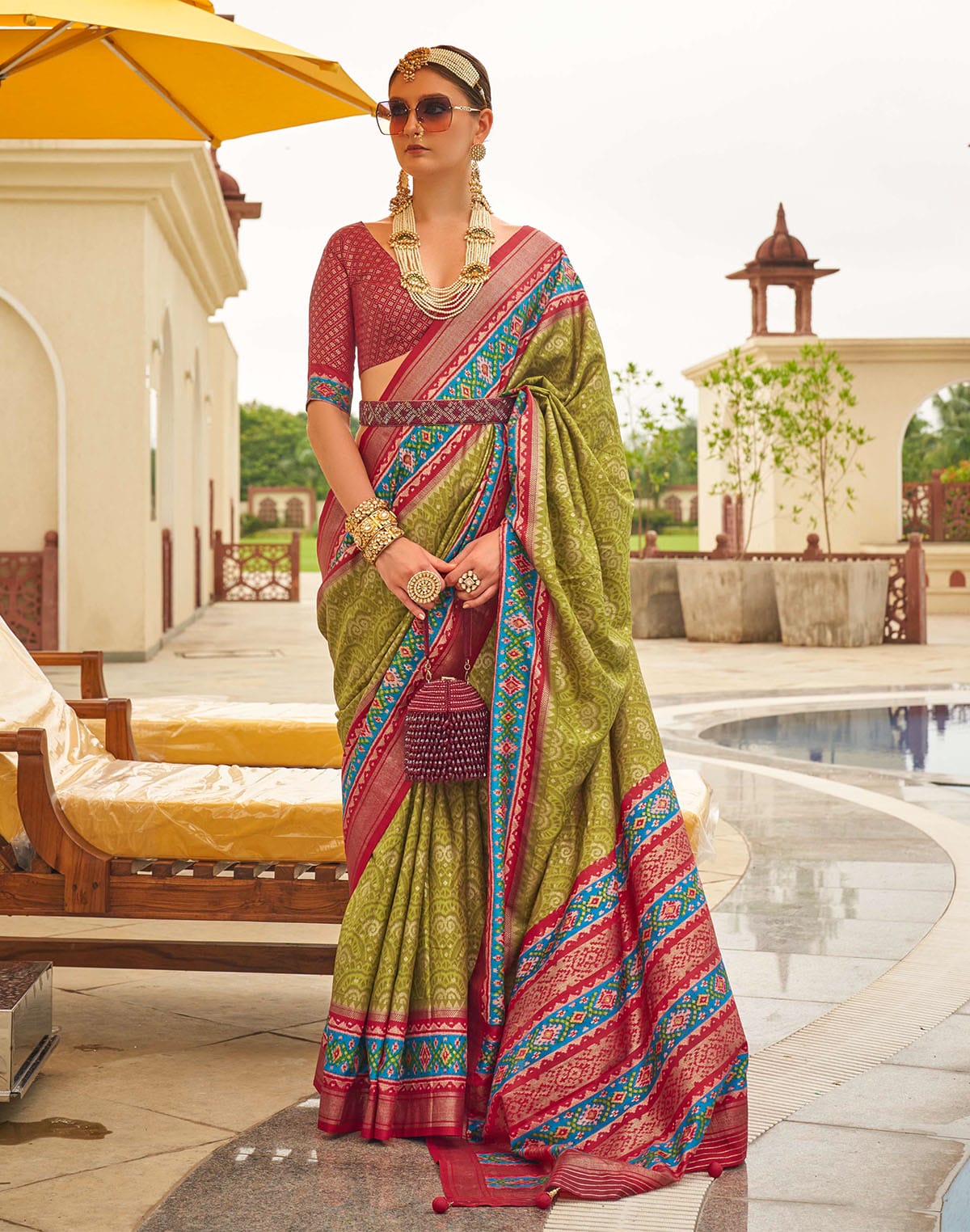 Collection of Patola Silk Fabric Mehendi Green Contrast Saree in a gallery layout