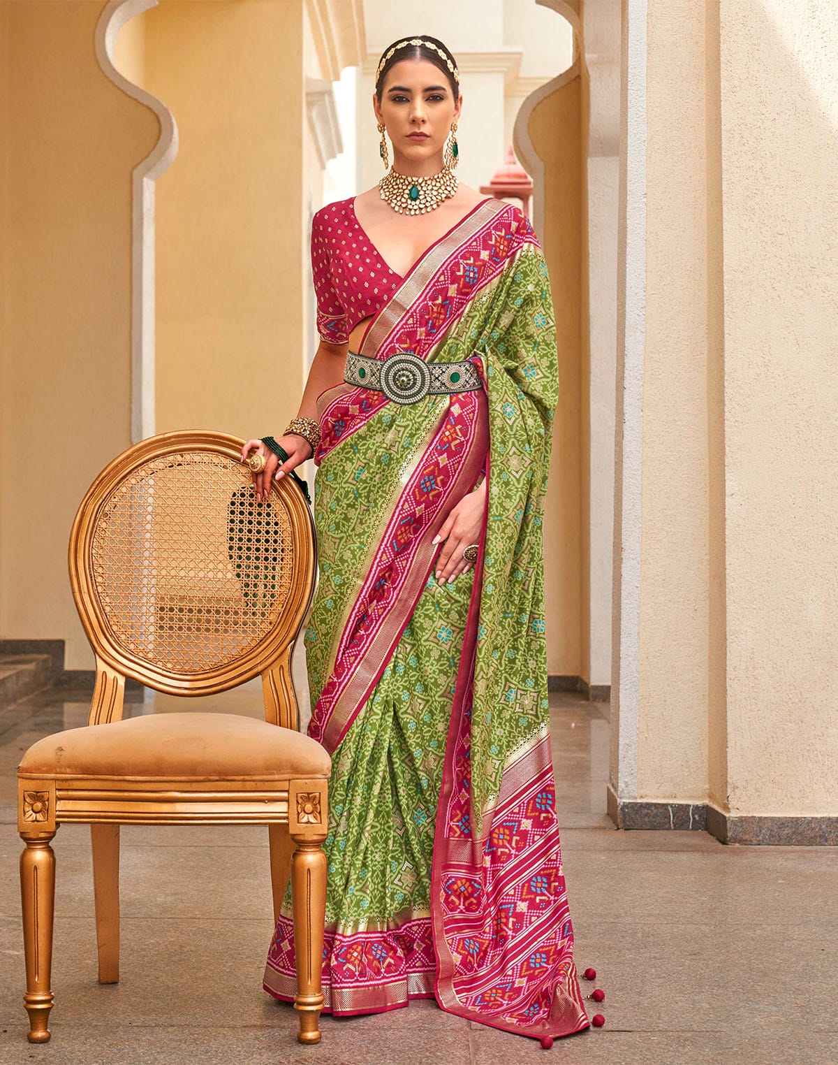 Collection of Green Patola Saree with Red Border in a gallery layout