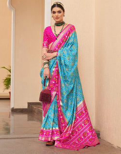 Collection of Elegant Sky Blue Colour Patola Silk Saree in a gallery layout