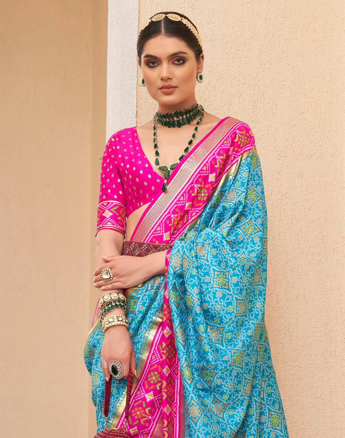 Collection of Elegant Sky Blue Colour Patola Silk Saree in a gallery layout