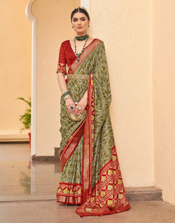 Collection of Mehendi Green all over Ikat Print Patola Designer Saree in a gallery layout