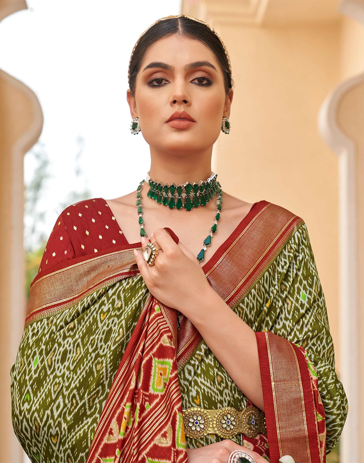 Collection of Mehendi Green all over Ikat Print Patola Designer Saree in a gallery layout