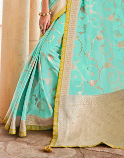 Collection of Turquoise Floral Dola Silk Banarasi Saree With Embroidery Blouse in a gallery layout