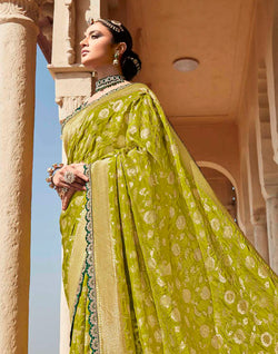 Collection of Mehendi Green Floral Fancy Lace Border Banarasi Dola Silk Saree With Designer Blouse in a gallery layout