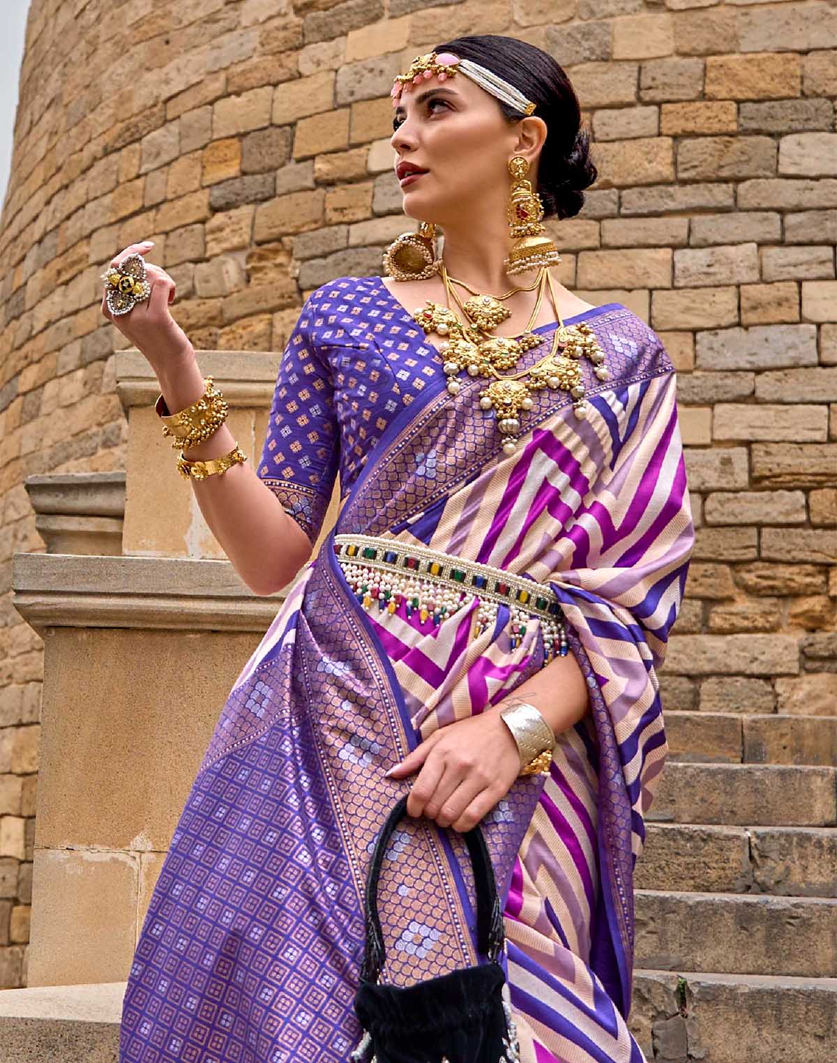 Collection of Violet Festive Designer Party Wear Saree in a gallery layout