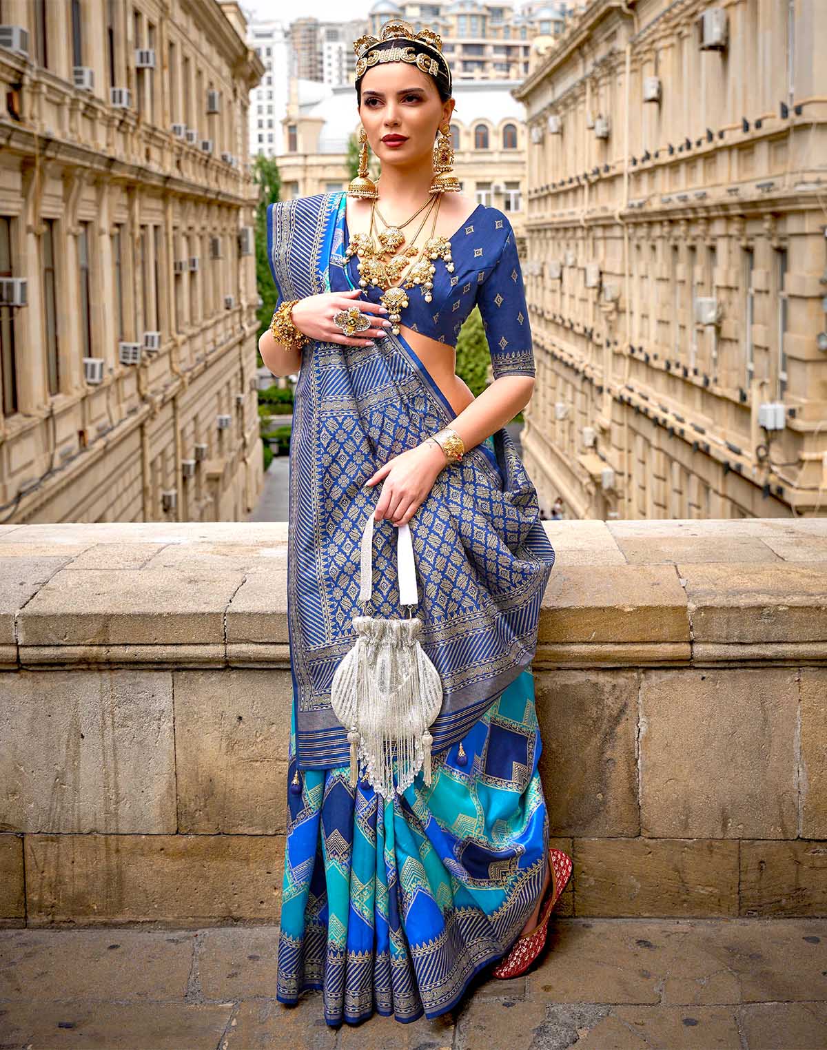 Collection of Sky Blue Coloured Patola Silk Designer Saree in a gallery layout