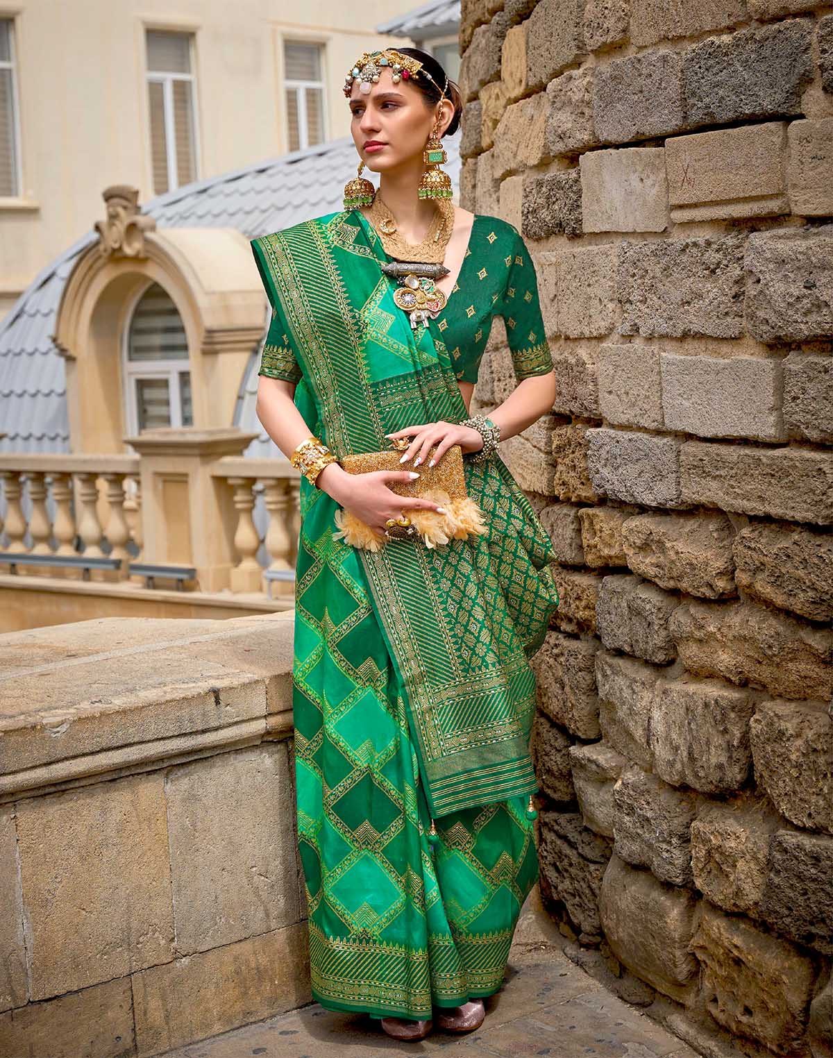 Collection of Stylish Green Patola Silk Festive Wear Saree in a gallery layout