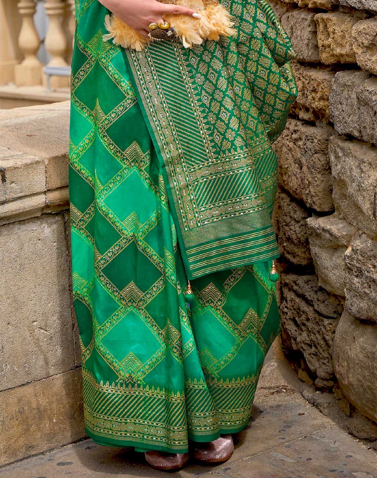 Collection of Stylish Green Patola Silk Festive Wear Saree in a gallery layout