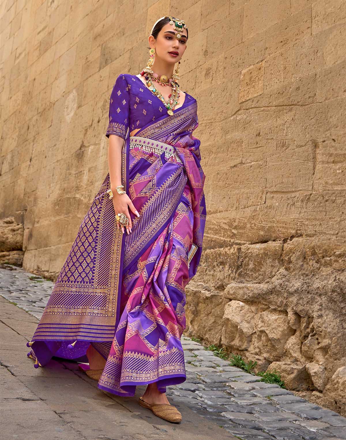 Collection of Purple Designer Patola Silk Saree in a gallery layout