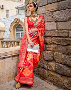 Collection of Orange Patola Silk Festive Wear Saree in a gallery layout