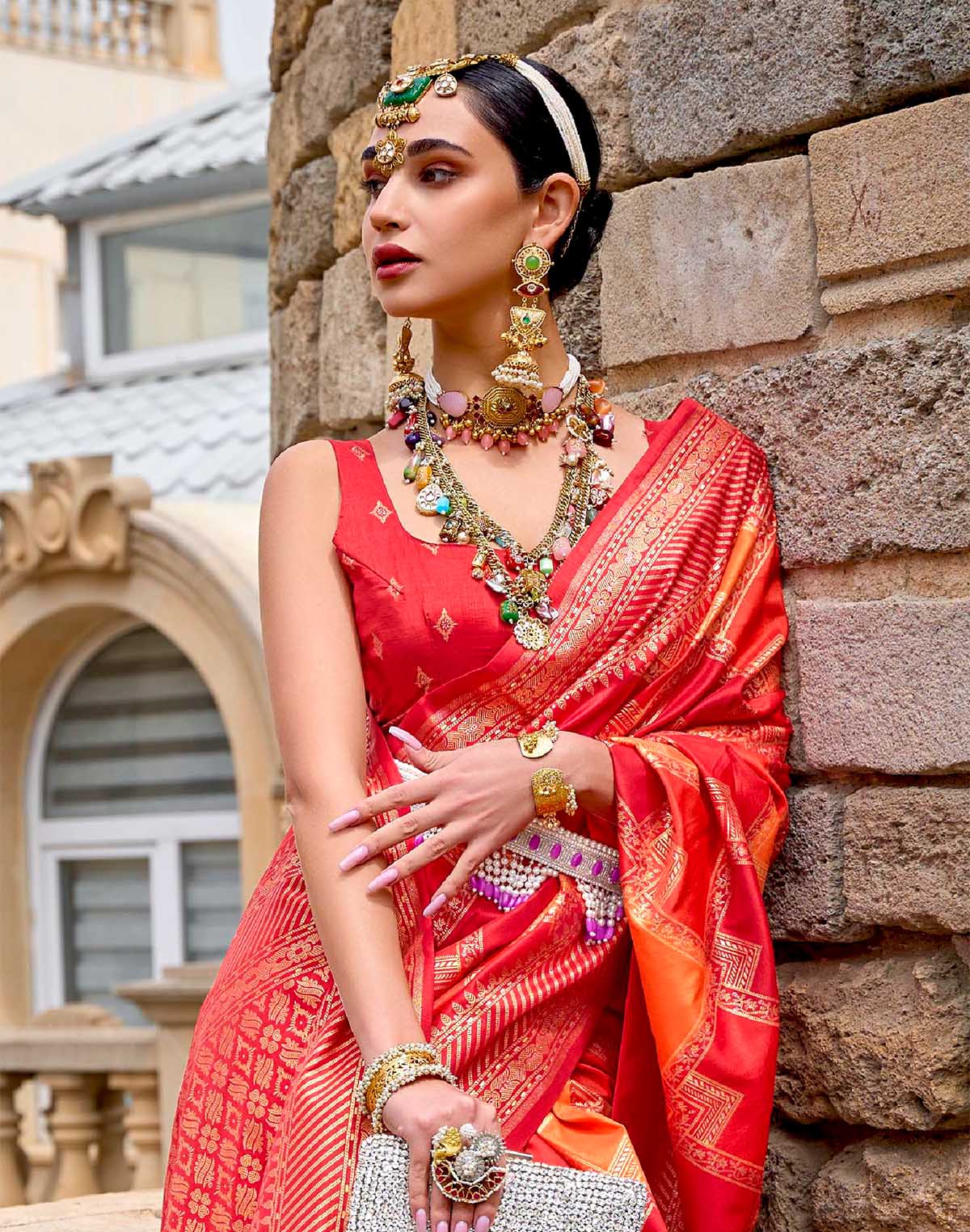 Collection of Orange Patola Silk Festive Wear Saree in a gallery layout