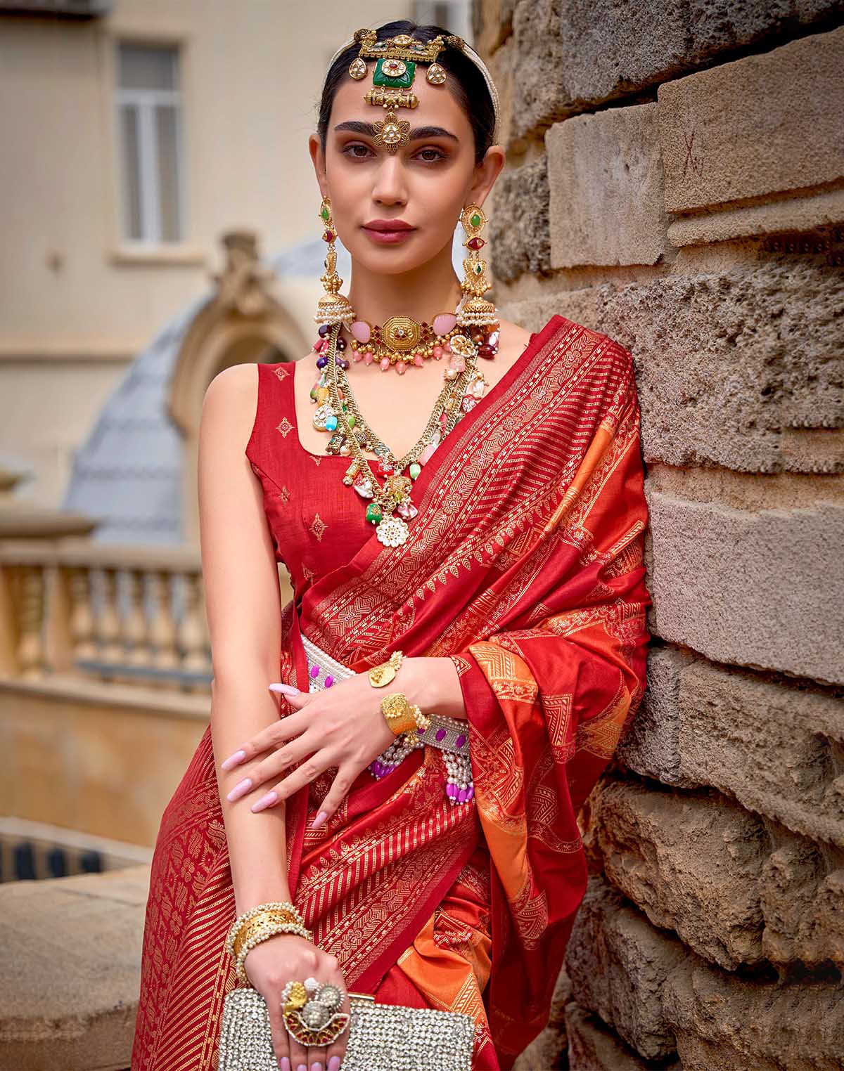 Collection of Orange Patola Silk Festive Wear Saree in a gallery layout