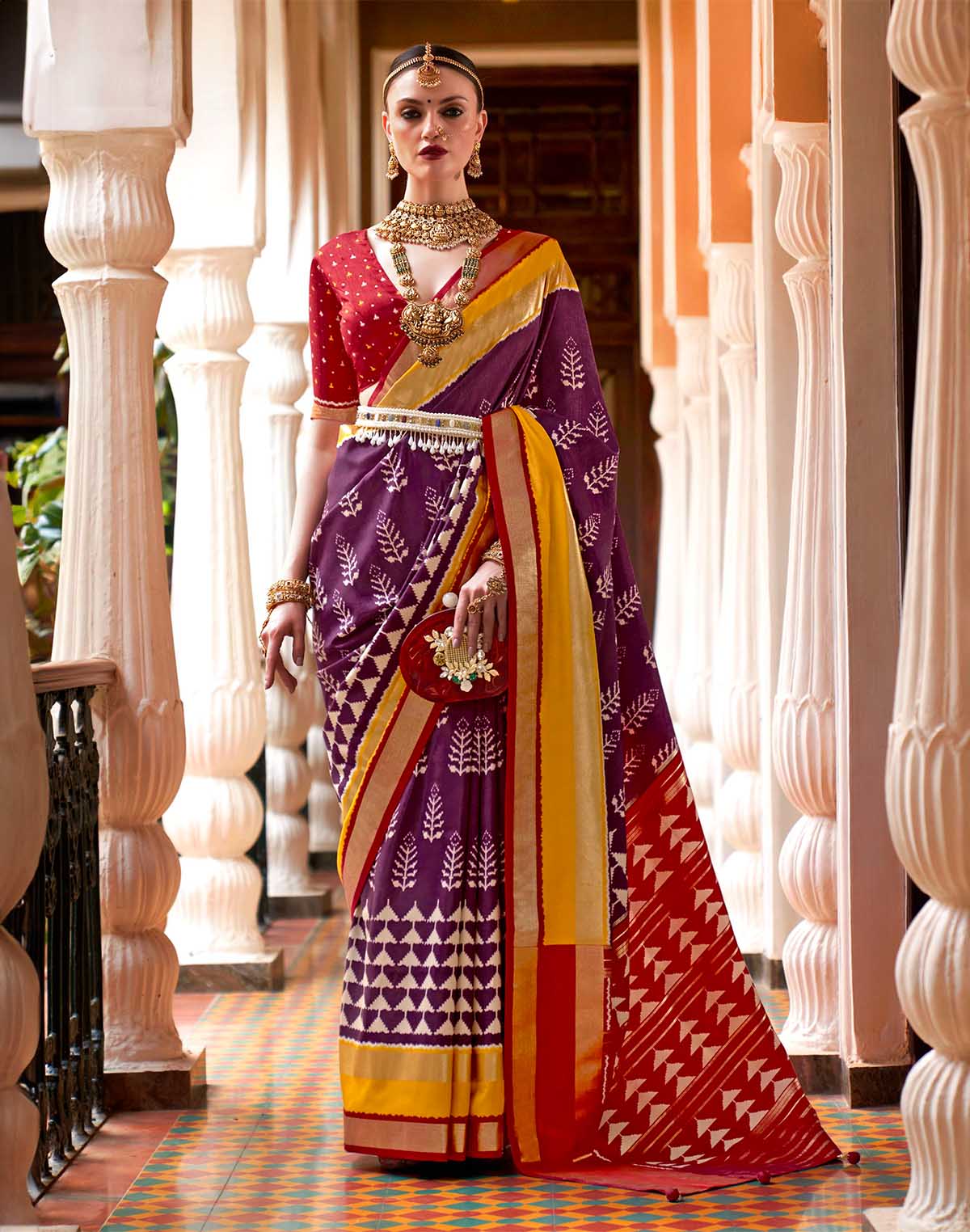 Collection of Purple Ikat Pattern Patola Silk Saree in a gallery layout