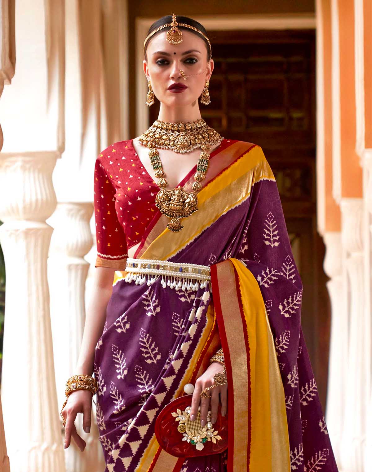 Collection of Purple Ikat Pattern Patola Silk Saree in a gallery layout