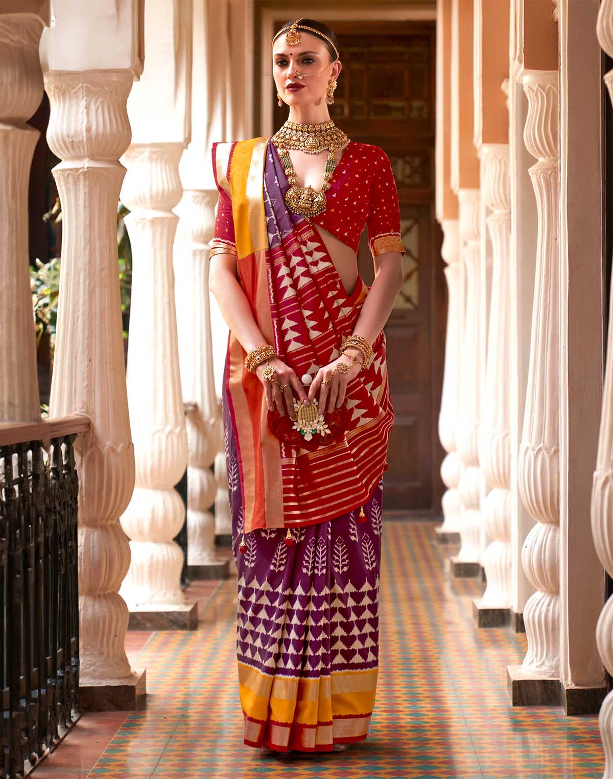 Collection of Purple Ikat Pattern Patola Silk Saree in a gallery layout