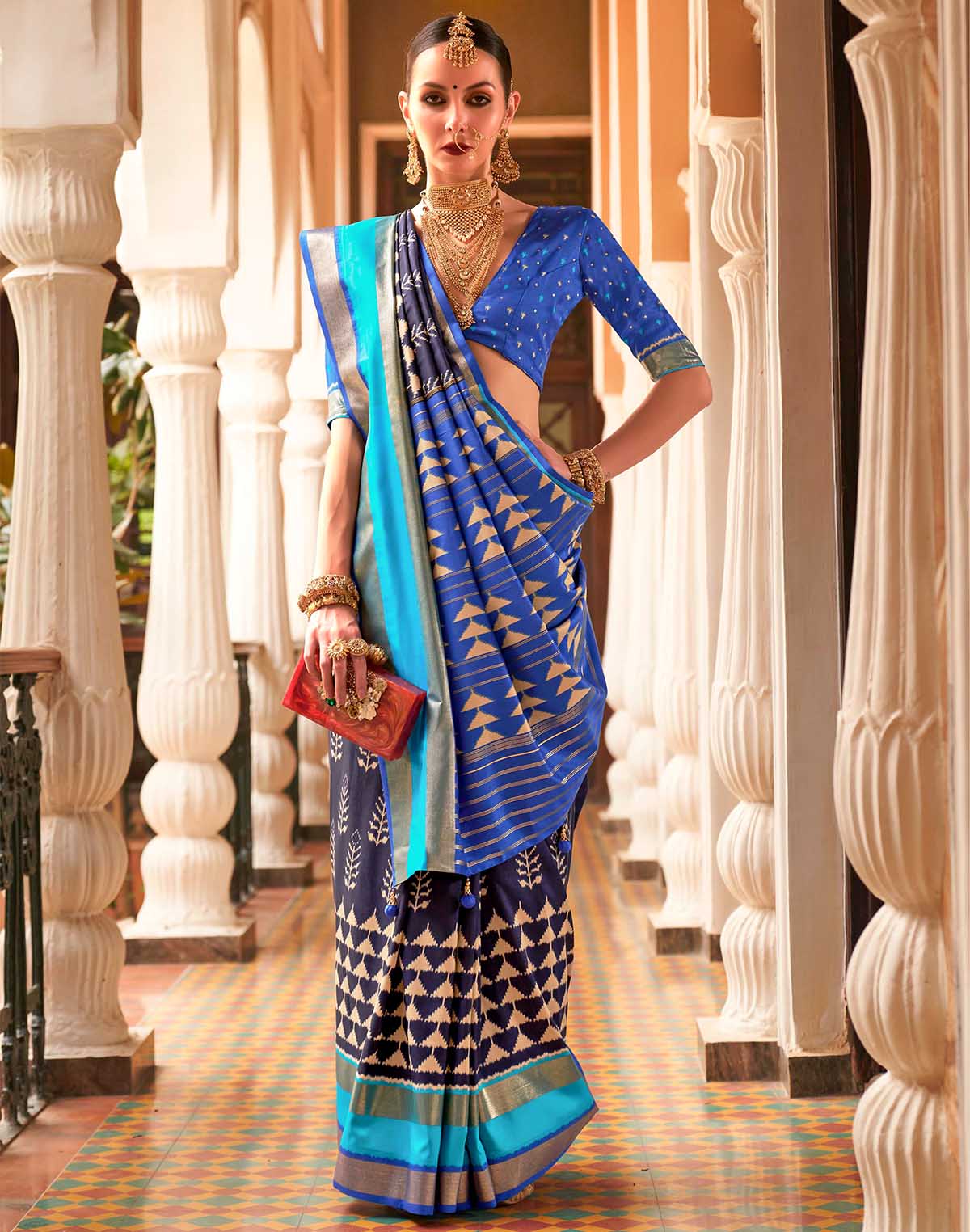 Collection of Navy Blue Woven Patola Silk Saree in a gallery layout