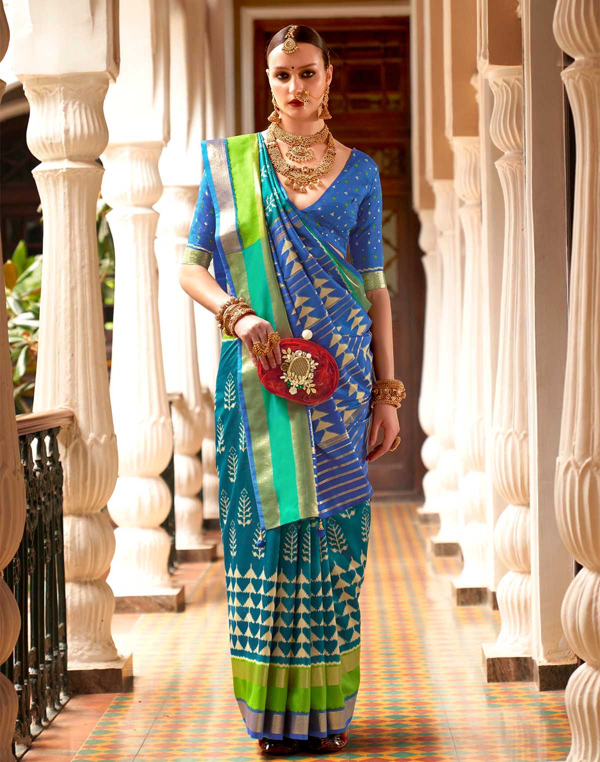 Collection of Teal Blue Patola Silk Woven Design Saree in a gallery layout