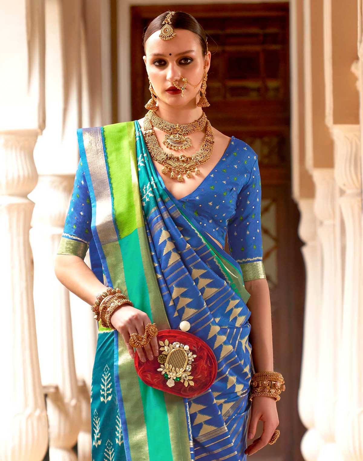 Collection of Teal Blue Patola Silk Woven Design Saree in a gallery layout